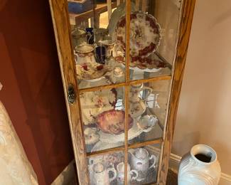Curio cabinet housing, an excellent selection of antique porcelain and china.