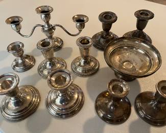 Nice selection of sterling silver items, including multiple candlesticks.