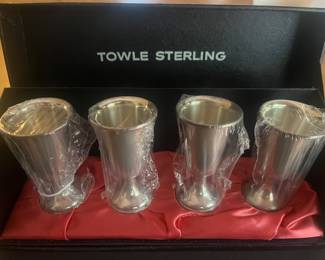 Set of four Towle unused sterling silver cordial cups with box.