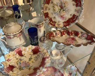 Extensive selection of antique hand-painted porcelain by R.S. Prussia and others.