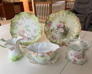 Extensive selection of antique hand-painted porcelain by R.S. Prussia and others.