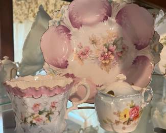 Extensive selection of antique hand-painted porcelain.