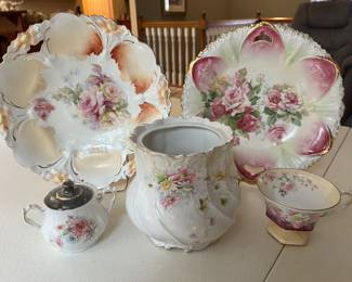 Extensive selection of antique hand-painted porcelain by R.S. Prussia and others.