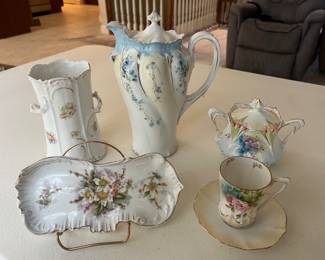 Extensive selection of antique hand-painted porcelain by R.S. Prussia and others.