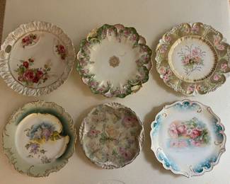 Extensive selection of antique hand-painted porcelain by R.S. Prussia and others.