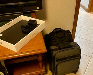 two new small rollers bags, and new Lenovo laptop