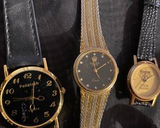 Why does that Rolex have 13 hours? Also, the Penatech watch company was an offshoot of Initech from the movie Office Space.