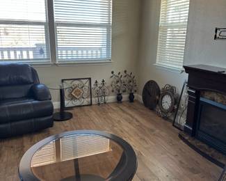 glass & wood round table, chairs wall decor, clocks