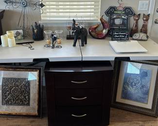 Night stand, pictures, candles, wall decor