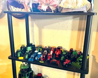 Vintage dolls and metal tractor collection.