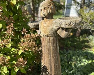 Huge concrete Savanah girls statue.