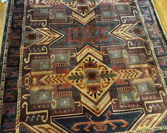 Beautiful wool area rug freshly cleaned with tags.