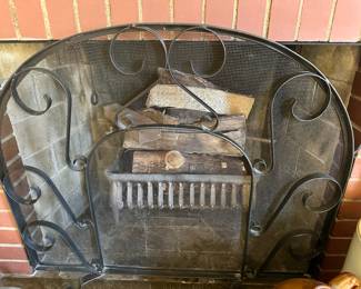 Wrought iron fireplace screen.