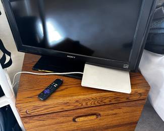 Sony TV and oak nightstand that matches dresser.