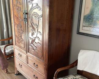 Chinese dragon phoenix cabinet - hardwood.  Our sweet clients were part of the first group
Of American workers in China in the 1970s