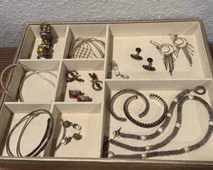 Silver Jewelry Set with Amber and Red Stone Accents, Including Bracelets, Earrings, Necklaces, and Cufflinks
