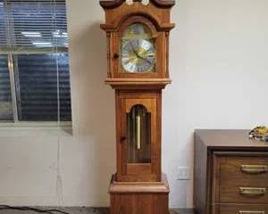 Vintage Handcrafted Wooden Grandfather Clock with Brass Pendulum and Ornate Dial