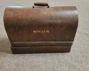 Vintage Singer Electric Sewing Machine with Wooden Case and Metal Detailing