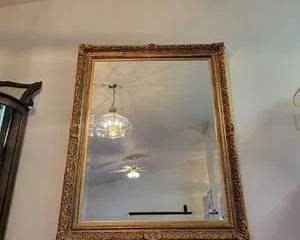 Vintage Wall Mirror with Intricate Floral and Scroll Carved Frame