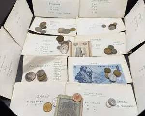 Vintage World Coin and Paper Money Collection with Labeled Inventory on Envelopes