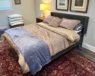 Beautiful area rug and lovely queen size tufted headboard bed set