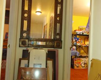 More art going on the wall and southwestern mirror