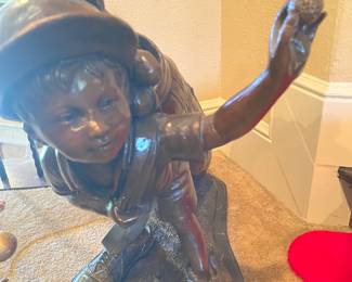 Bronze golfer statue