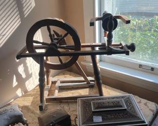 Spinning wheel -- if you're into these -- please come -- we have lots more