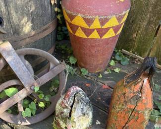 Ceramic vase and old wooden buoys