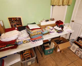 So many tablecloths, towels, and frames