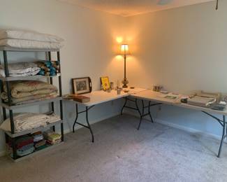 Linens, collectibles, office supplies, and lamp