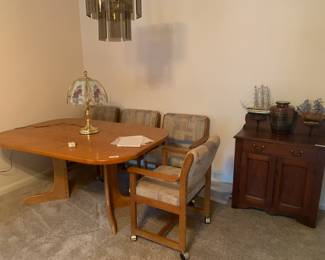 Dining table, vintage side cabinet and decor