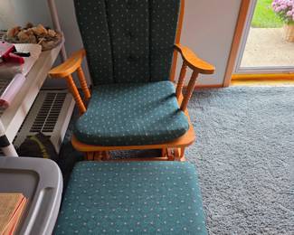 Glider with stool.