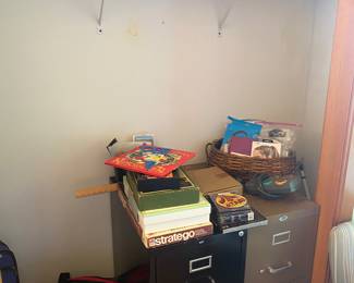 2 drawer file cabinets, books, board games