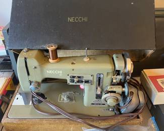 Necchi sewing machine with attachments