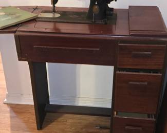 Singer Sewing Machine in Cabinet