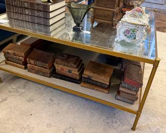 Another view of the mirror/shagreen coffee table, plus a fab collection of antique French books!