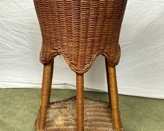 Antique wicker plant stand