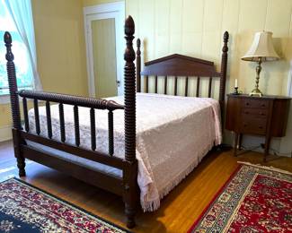 Antique Four Poster Bed by Continental Furniture Company in an 18th American Empire Revival Style and an antique Martha Washington Sewing cabinet