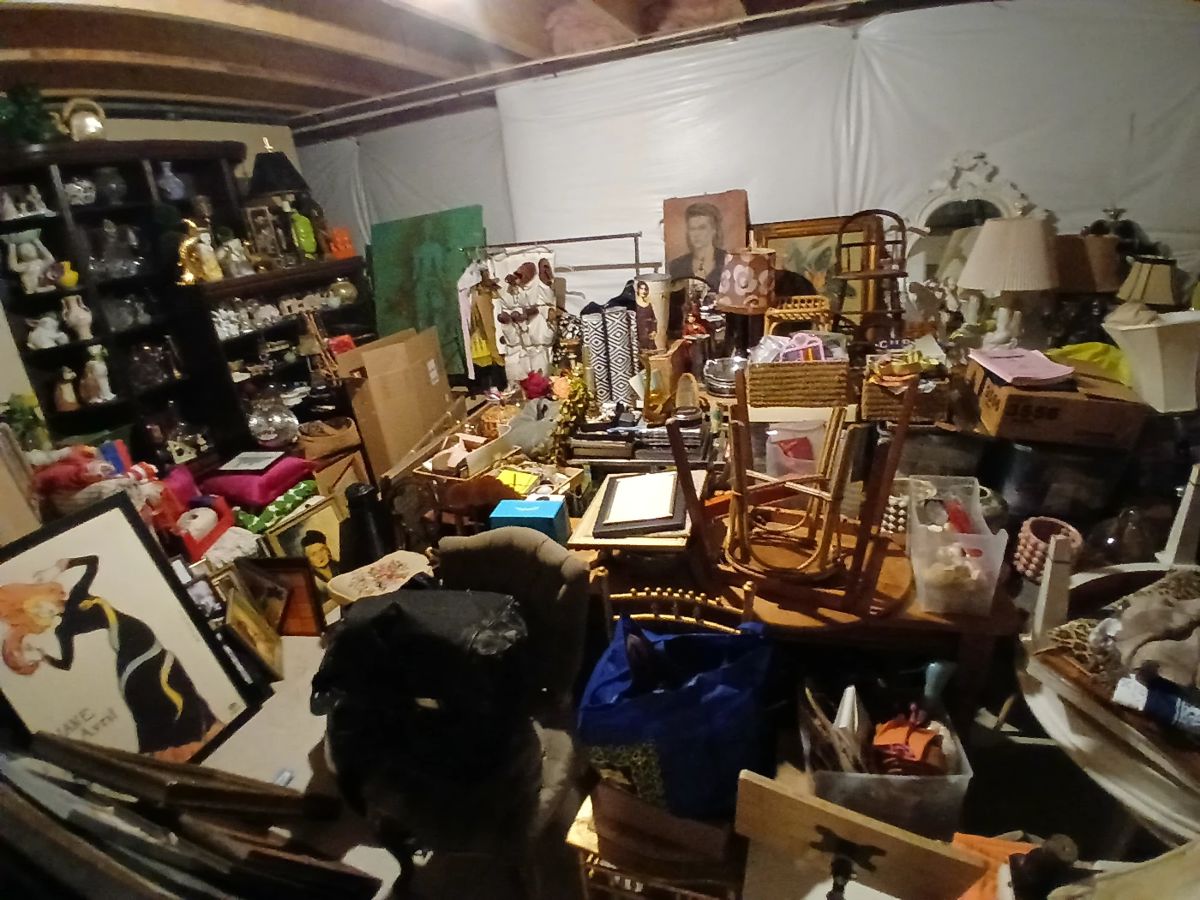 BASEMENT STORAGE BEFORE ORGANIZATION AND DISPLAY