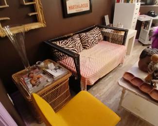 black wicker two seat sofa, rattan end table, framed