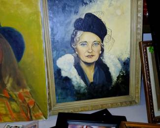 mid century portrait of woman in black hat with white fur collar