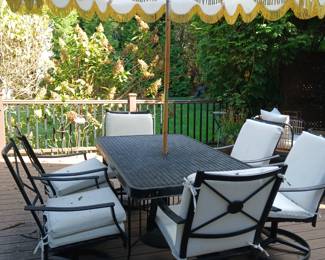 patio table, umbrella with gold fringe and 6 black chairs, duck cloth upholstered cushions ( new)