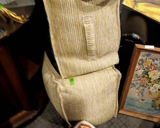 two linen colored woven bean bag hassocks