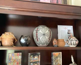 There are sevarl poeces of better Native American pottery