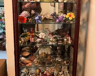 Another curio cabinet of various smalls