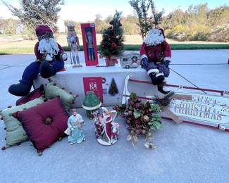 "4 pillows 10"" square, fitz & Floyd 9 1/2 tall Nativity (hand painted) plays tunes "" Hark The Herald Angles song"" 9""x34x 12, sleigh camper 8x5 and it lights up when you plug it in, 7.6 Pre- Lit Christmas tree, 2 nutcrackers one is dresses in his beach clothes, the other is dresses in gold and silver. 2 piece tin cancer holde decor, Xmas tree with red cardinals 19"" "