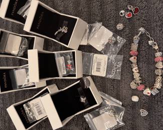 Lot of Pandora sterling silver charms and bracelet, includes collector retired Disney