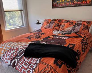 Full queen bed with mattress and bedding set