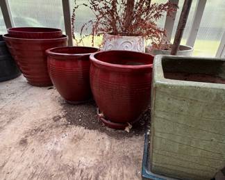 Assorted planters. All sizes and materials from ceramic to metal to wooden to plastic. LOT 28